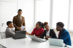 team-young-african-people-office-table-with-laptop_219728-4566